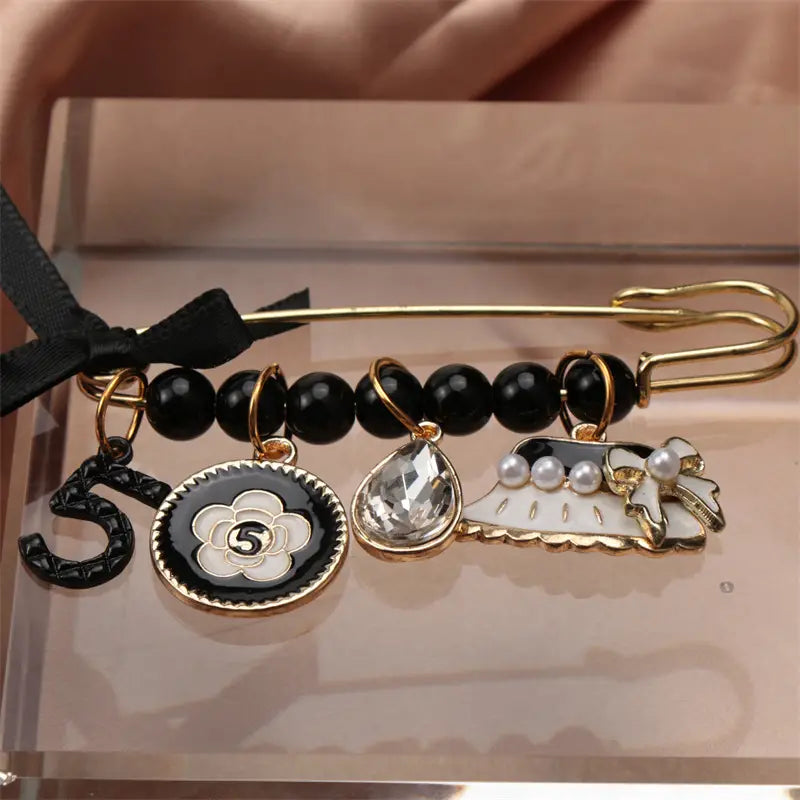 CC BROOCH PIN