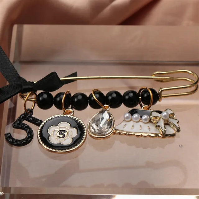 CC BROOCH PIN